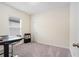 Home office featuring a standing desk and window at 2352 Litchfield Loop, Deland, FL 32720