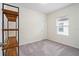 Bright bedroom with neutral walls and carpeted floor at 2352 Litchfield Loop, Deland, FL 32720