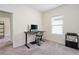 Modern home office with standing desk and window at 2352 Litchfield Loop, Deland, FL 32720