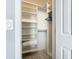 Large walk-in closet with shelving and hanging rods at 5303 S Atlantic Ave # 270, New Smyrna Beach, FL 32169