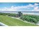 Ocean view from beachfront property with lush landscaping at 5303 S Atlantic Ave # 270, New Smyrna Beach, FL 32169