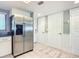 Modern kitchen features stainless steel appliances and white cabinets at 5303 S Atlantic Ave # 270, New Smyrna Beach, FL 32169