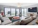 Spacious living room with sectional sofa and ocean view at 5303 S Atlantic Ave # 270, New Smyrna Beach, FL 32169