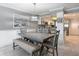 Bright dining area with a rustic table and bench at 5303 S Atlantic Ave # 270, New Smyrna Beach, FL 32169