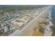 Beachfront property aerial view, showing building and ocean at 3801 S Atlantic Ave # 307, New Smyrna Beach, FL 32169