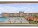 View of the community pool, hot tub, and ocean at 3801 S Atlantic Ave # 307, New Smyrna Beach, FL 32169