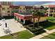 Community building with seating and a covered patio area at 3801 S Atlantic Ave # 307, New Smyrna Beach, FL 32169