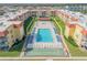 Aerial view of the complex, pool, and shuffleboard at 3801 S Atlantic Ave # 307, New Smyrna Beach, FL 32169