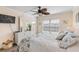 King-size bed, dresser, TV and access to a private balcony at 3801 S Atlantic Ave # 307, New Smyrna Beach, FL 32169
