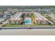 Aerial view of a coastal condo complex with a pool and oceanfront location at 3801 S Atlantic Ave # 307, New Smyrna Beach, FL 32169
