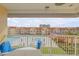 Balcony view of the resort-style pool and surrounding area at 3801 S Atlantic Ave # 307, New Smyrna Beach, FL 32169
