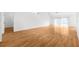 Large living room with laminate wood flooring and lots of natural light at 172 Gull S Dr, Daytona Beach, FL 32119