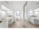 Spacious bathroom with double sinks, garden tub, and separate shower at 172 Gull S Dr, Daytona Beach, FL 32119