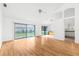 Spacious living room with hardwood floors and sliding doors to patio at 172 Gull S Dr, Daytona Beach, FL 32119