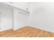 Bright bedroom with wood floors and a closet at 172 Gull S Dr, Daytona Beach, FL 32119