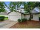 Two-story house with a two-car garage and landscaping at 172 Gull S Dr, Daytona Beach, FL 32119