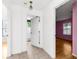 Clean hallway with doors leading to rooms and bath at 172 Gull S Dr, Daytona Beach, FL 32119