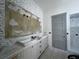 Bathroom with double vanity and gray walls, under construction at 213 Cedar Ave, New Smyrna Beach, FL 32169