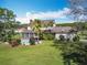 Aerial view of house, pool, and expansive backyard at 2471 Jenscot Rd, Saint Cloud, FL 34771