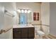 Clean bathroom with single vanity, toilet, and updated fixtures at 3608 Romea Cir, New Smyrna Beach, FL 32168