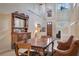 Formal dining room with an antique buffet and a wood table at 3608 Romea Cir, New Smyrna Beach, FL 32168