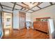 Bedroom with hardwood floors, large windows, and plenty of natural light at 3608 Romea Cir, New Smyrna Beach, FL 32168