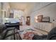 Living room with high ceilings, hardwood floors, and built in shelving at 3608 Romea Cir, New Smyrna Beach, FL 32168