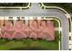 Aerial view of a residential community with houses and a pond at 3608 Romea Cir, New Smyrna Beach, FL 32168