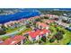 Aerial view of waterfront community and landscaping at 452 Bouchelle Dr # 303, New Smyrna Beach, FL 32169