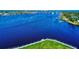 Aerial view of waterfront walkway and waterway at 452 Bouchelle Dr # 303, New Smyrna Beach, FL 32169