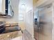 Kitchen with stainless steel appliances and granite countertops at 452 Bouchelle Dr # 303, New Smyrna Beach, FL 32169