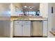 Kitchen with stainless steel appliances and granite countertops at 452 Bouchelle Dr # 303, New Smyrna Beach, FL 32169
