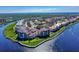 Aerial view of waterfront community and landscaping at 452 Bouchelle Dr # 303, New Smyrna Beach, FL 32169