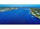 Wide aerial view of waterfront homes and bridge at 452 Bouchelle Dr # 303, New Smyrna Beach, FL 32169
