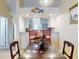 Bright dining area with kitchen pass-through at 452 Bouchelle Dr # 303, New Smyrna Beach, FL 32169