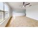 Bedroom with water view and ceiling fan at 5336 Georgia Peach Ave, Port Orange, FL 32128