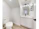 Modern bathroom with updated vanity, quartz countertop, and new toilet at 5336 Georgia Peach Ave, Port Orange, FL 32128