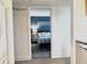 View into a bedroom with a blue wall and a bed at 5207 S Atlantic Ave # 0622, New Smyrna Beach, FL 32169