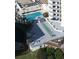 Community shuffleboard court with pool and building view at 5207 S Atlantic Ave # 0622, New Smyrna Beach, FL 32169