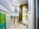 Charming bathroom with pedestal sink and shower/tub combo at 5207 S Atlantic Ave # 0622, New Smyrna Beach, FL 32169