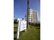 Seascape Towers building signage with lush landscaping at 5207 S Atlantic Ave # 0622, New Smyrna Beach, FL 32169