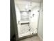 Large walk-in shower with pebble floor and built-in seat at 5207 S Atlantic Ave # 0622, New Smyrna Beach, FL 32169