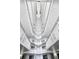 Interior view of a multi-story building's atrium with multiple levels of balconies and railings at 5207 S Atlantic Ave # 0622, New Smyrna Beach, FL 32169
