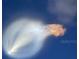 Close-up view of rocket launch with smoke trail at 5207 S Atlantic Ave # 0622, New Smyrna Beach, FL 32169