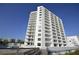 High-rise building with ocean view, balcony, and boardwalk at 5207 S Atlantic Ave # 0622, New Smyrna Beach, FL 32169