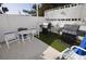Community grilling area with tables and chairs at 5207 S Atlantic Ave # 0622, New Smyrna Beach, FL 32169