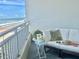 Relax on this condo balcony, enjoying breathtaking ocean views at 5207 S Atlantic Ave # 0622, New Smyrna Beach, FL 32169