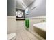 Clean bathroom with a vintage style sink and storage at 5207 S Atlantic Ave # 0622, New Smyrna Beach, FL 32169