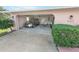 Attached garage with space for one car and additional storage at 110 Ponce Terrace Cir, Ponce Inlet, FL 32127