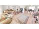 Open concept living room with views into kitchen and dining areas at 110 Ponce Terrace Cir, Ponce Inlet, FL 32127